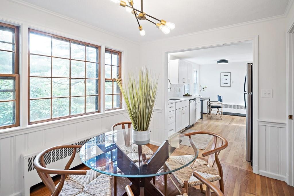 93 Meadowbrook Road Needham, MA 02492 - Photo 13 of 34 a view of a dining room with furniture window and outside view
