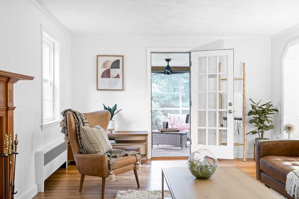 93 Meadowbrook Road Needham, MA 02492 - Photo 19 of 34 a living room with furniture and a potted plant