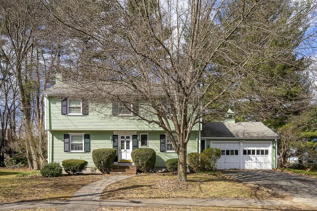93 Meadowbrook Road Needham, MA 02492 - Photo 2 of 34 a front view of a house with garden