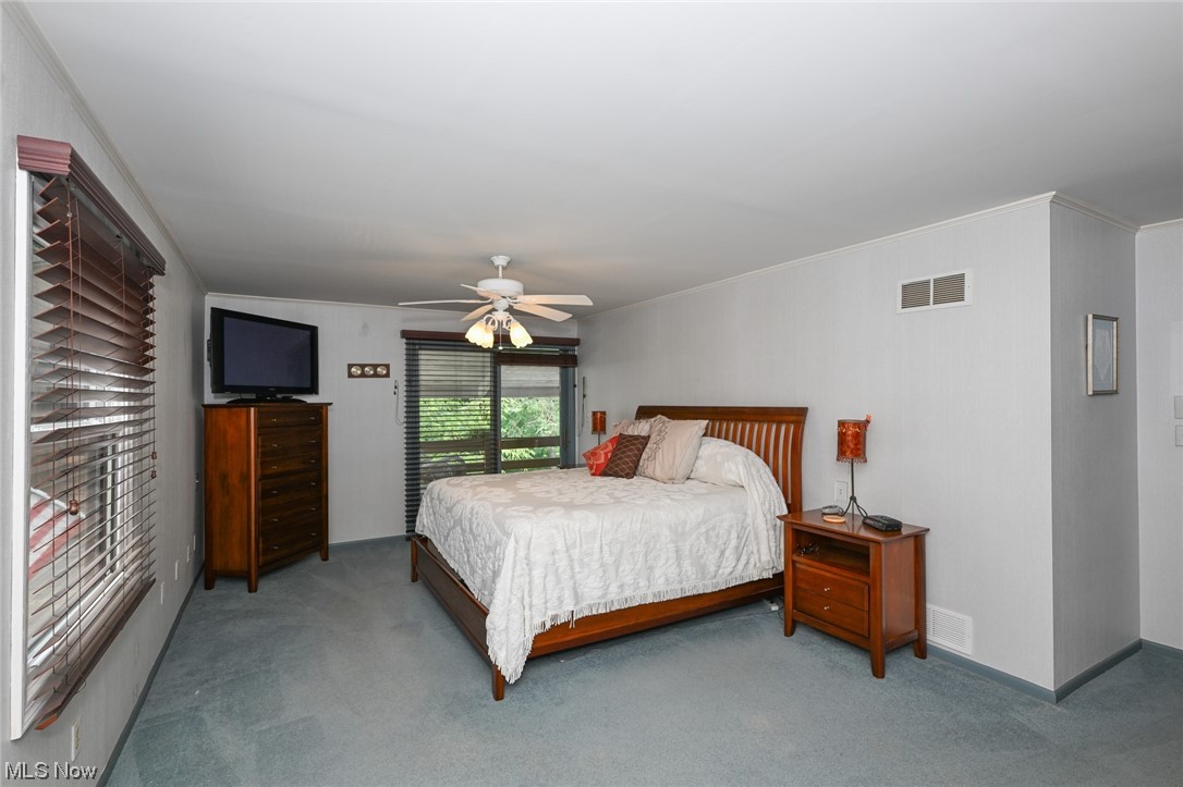 171 Granger Road, Unit 138 Medina, OH 44256 - Photo 11 of 31 Nicely sized primary bedroom is a true owners retreat with sliding doors out to a full balcony where you can enjoy your morning coffee or end of the day drink.