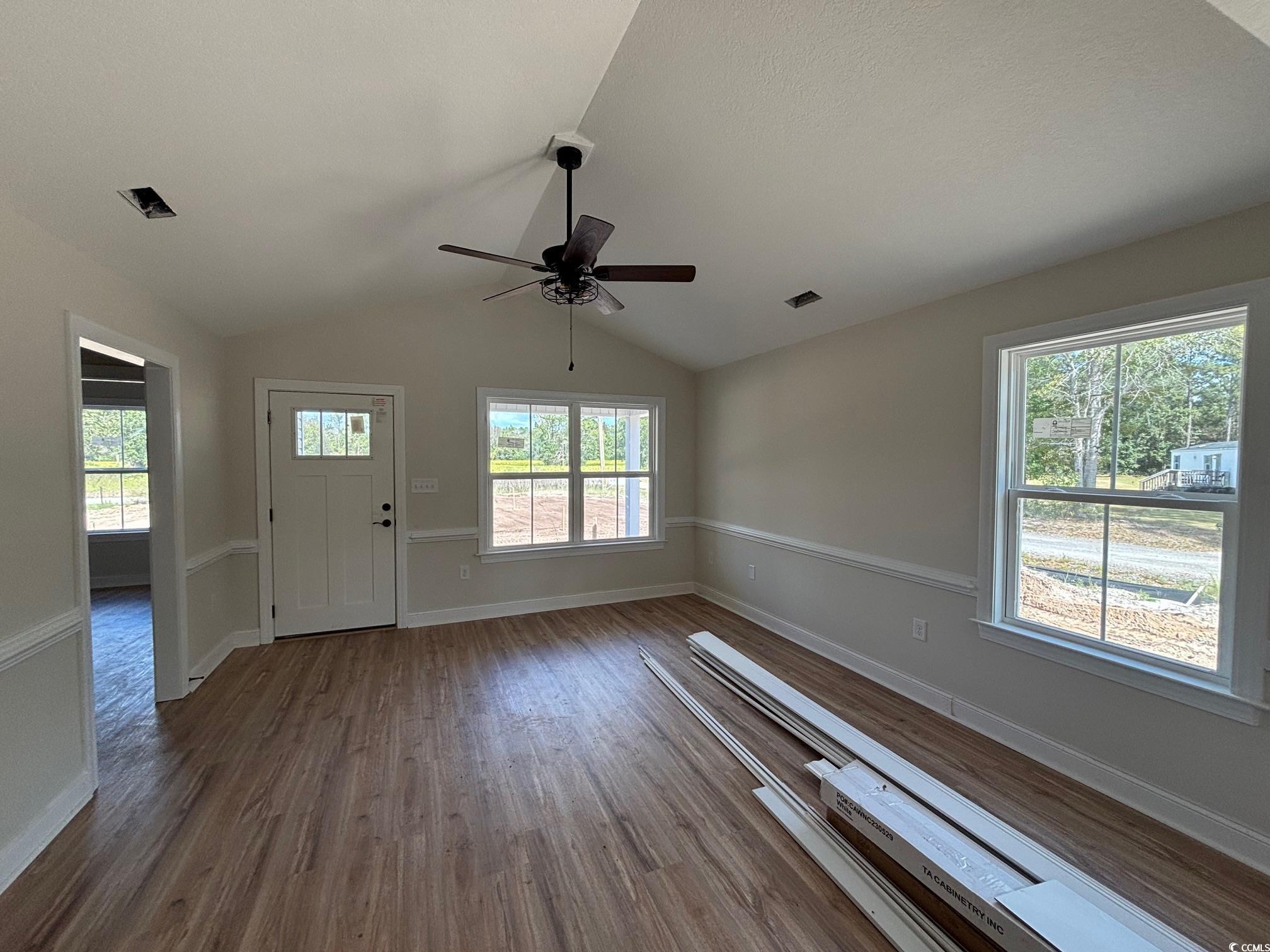 1721 Southern Crest Drive Loris, SC 29569 - Photo 5 of 16 Foyer entrance with wood finished floors, vaulted ceiling, and ceiling fan