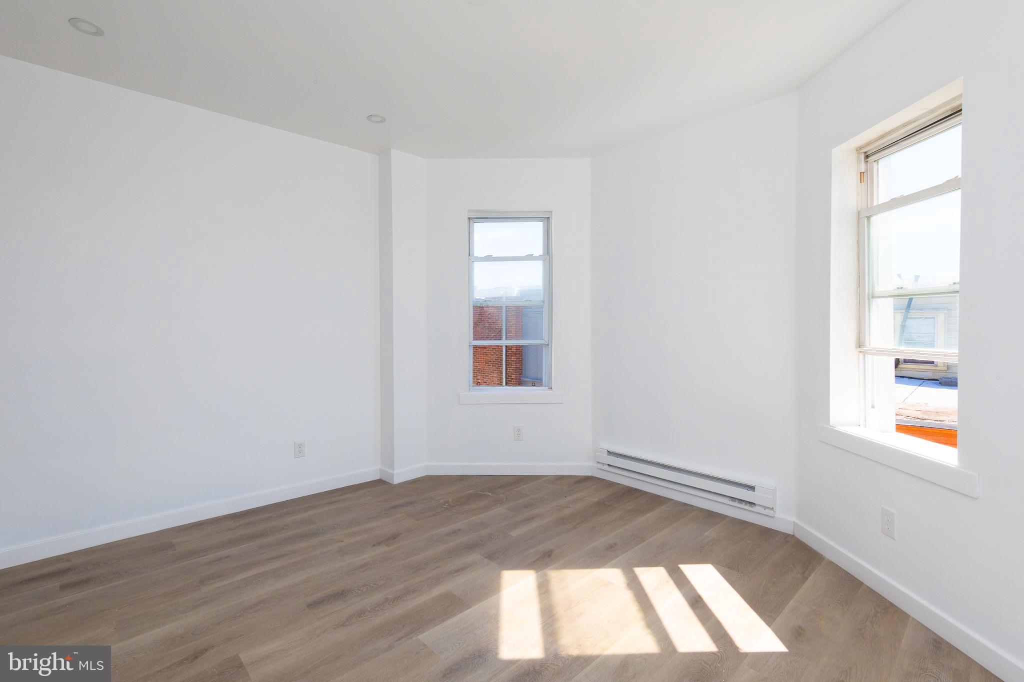 1841 North 33rd Street Philadelphia, PA 19121 - Photo 23 of 29 an empty room with a window