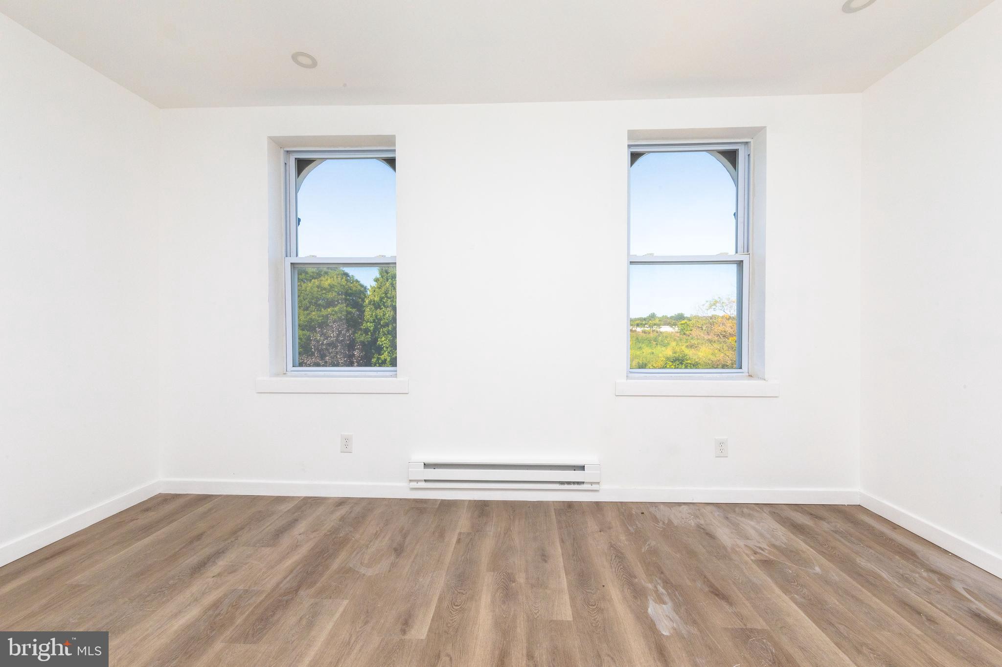 1841 North 33rd Street Philadelphia, PA 19121 - Photo 8 of 29 an empty room with a window