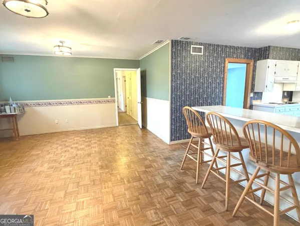 a view of a livingroom with furniture