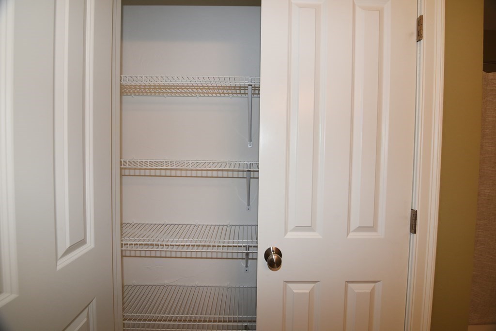 2 Mariner's Drive, Unit 2 (AKA 66) Marshfield, MA 02050 - Photo 30 of 41 a bathroom with a glass shower door
