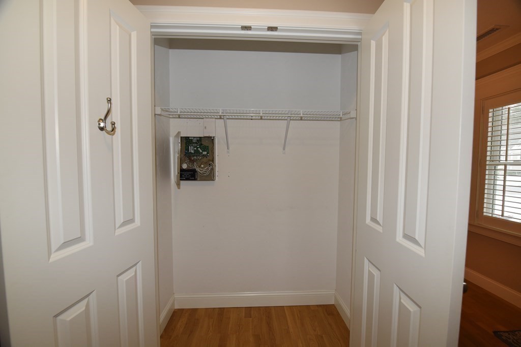 2 Mariner's Drive, Unit 2 (AKA 66) Marshfield, MA 02050 - Photo 33 of 41 a view of a small space with wooden floor and closet