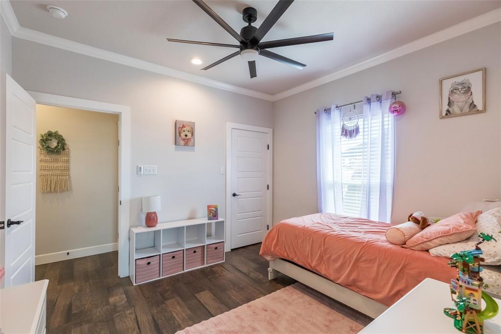 107 Kleingrass Road Abilene, TX 79606 - Photo 23 of 33 Bedroom featuring wood-finish flooring, white trim, recessed lighting, and a ceiling fan