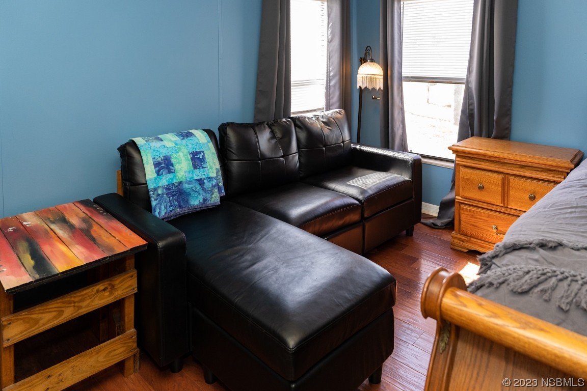 106 Charles Street Edgewater, FL 32141 - Photo 36 of 89 a living room with furniture and a window