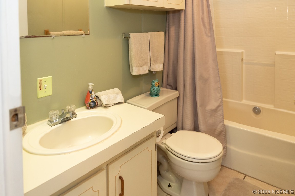 106 Charles Street Edgewater, FL 32141 - Photo 44 of 89 a bathroom with a sink a toilet and shower