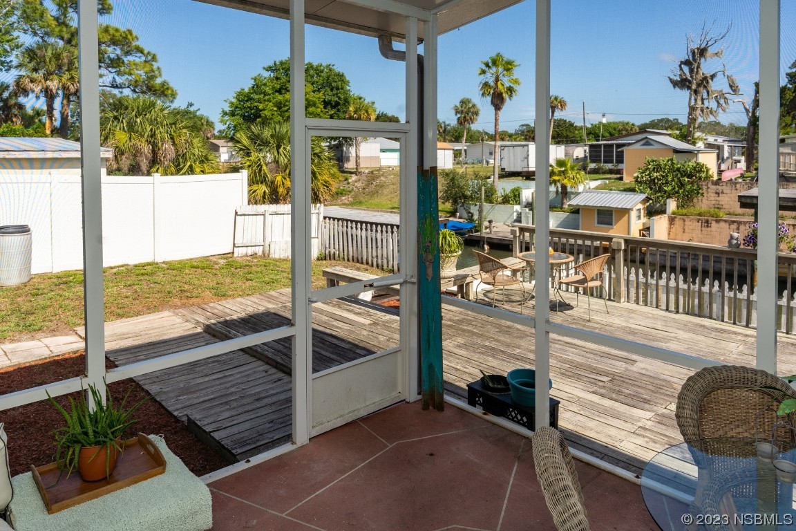 106 Charles Street Edgewater, FL 32141 - Photo 54 of 89 a view of a balcony with chairs