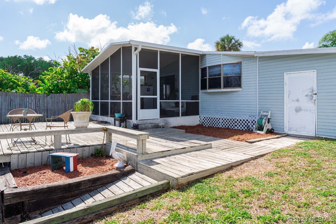 106 Charles Street Edgewater, FL 32141 - Photo 61 of 89 a front view of house with yard