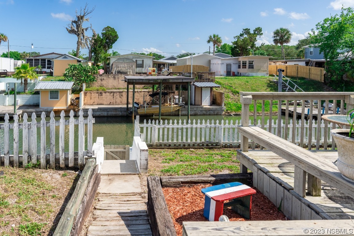 106 Charles Street Edgewater, FL 32141 - Photo 68 of 89 a view of balcony with wooden floor and seating space
