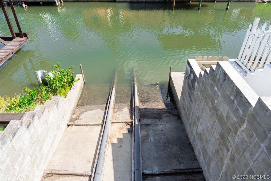 106 Charles Street Edgewater, FL 32141 - Photo 74 of 89 a view of a swimming pool with a patio
