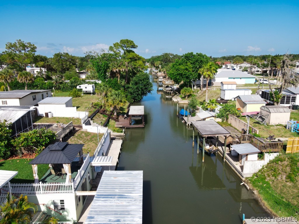 106 Charles Street Edgewater, FL 32141 - Photo 87 of 89 a view of residential houses with outdoor space and lake view