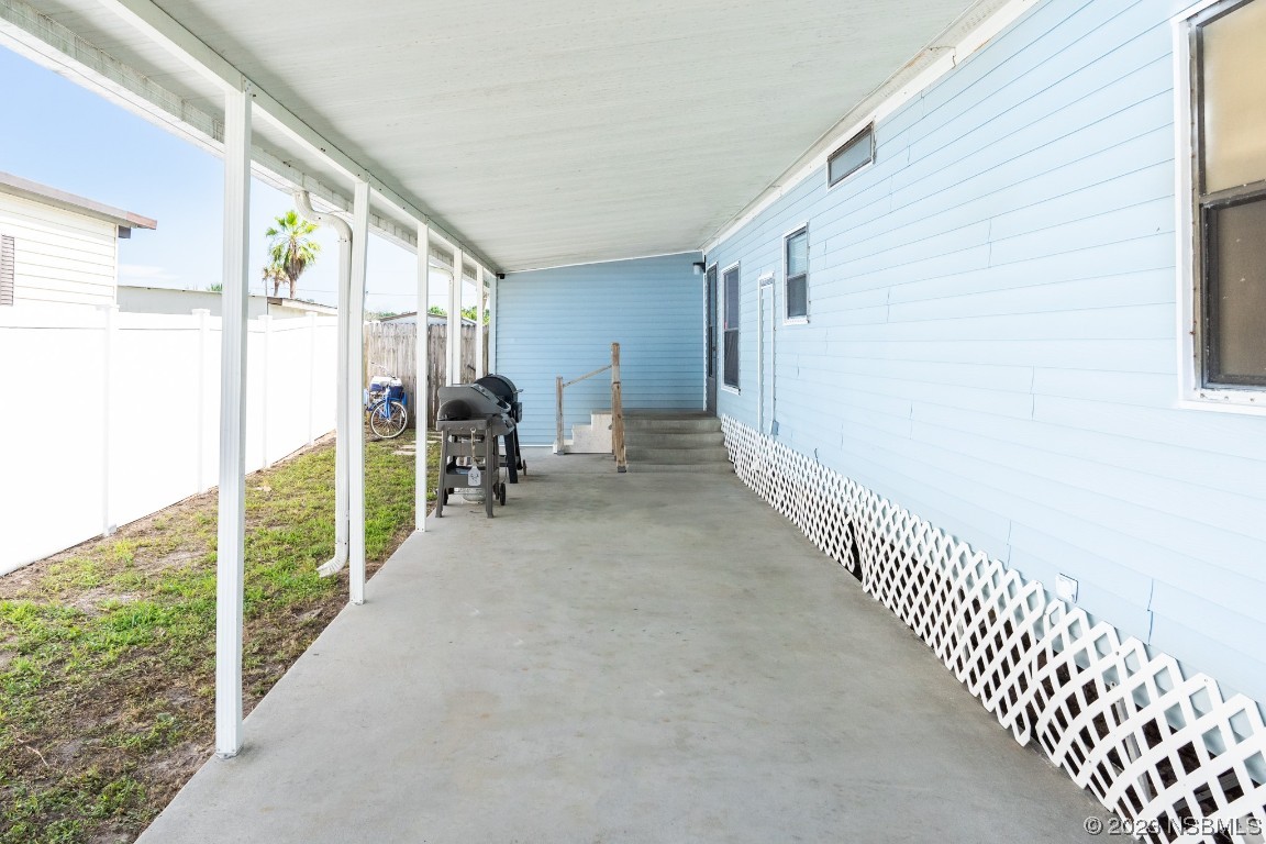 106 Charles Street Edgewater, FL 32141 - Photo 9 of 89 a view of hallway with patio