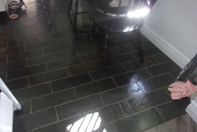 a view of entryway and hall with a dining table