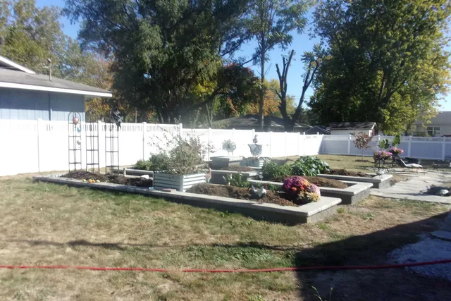 a view of a house with a tree