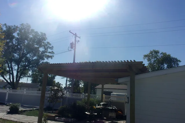 a garden view with a sitting space