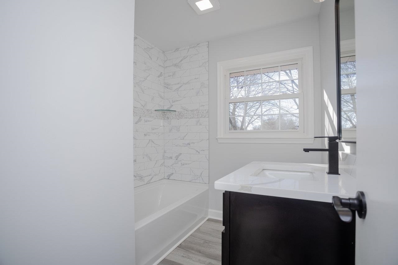 12 Essex Road Grottoes, VA 24441 - Photo 34 of 65 a bathroom with a sink and a bathtub