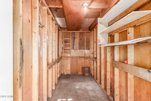 a view of a hallway with a window
