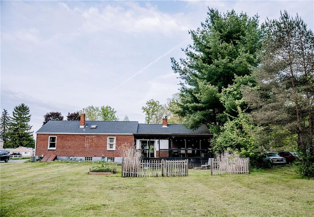 128 Steppland Road Butler, PA 16002 - Photo 13 of 14 a front view of a house with garden