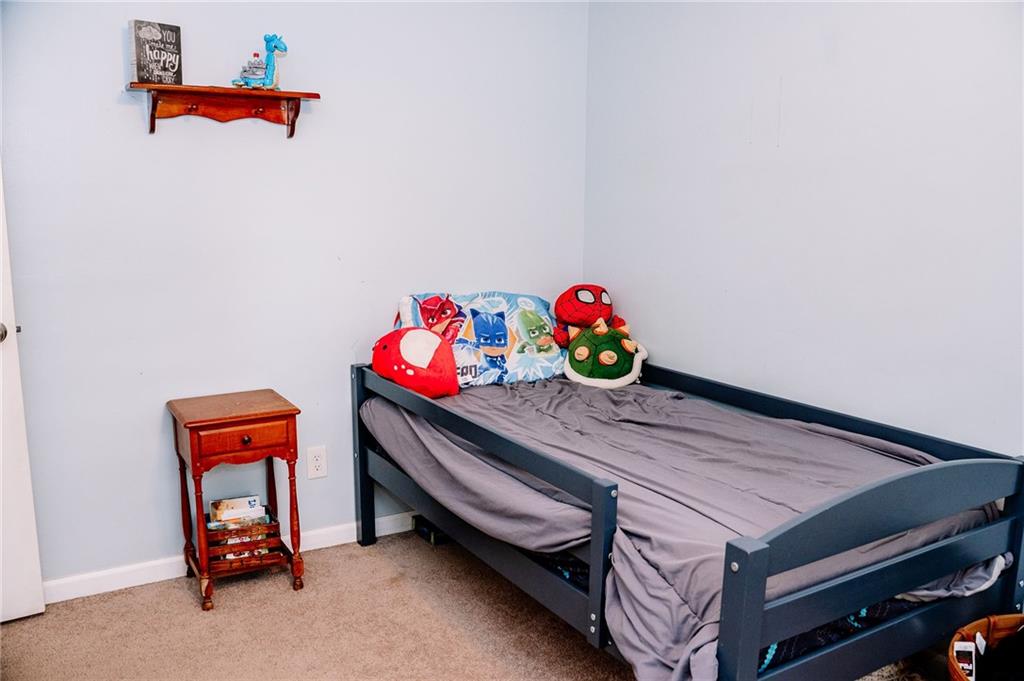 128 Steppland Road Butler, PA 16002 - Photo 9 of 14 a room with toys and storage