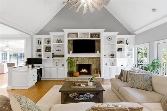 a kitchen with stainless steel appliances a refrigerator sink and cabinets
