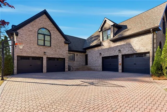 a view of a house with swimming pool yard and sitting area