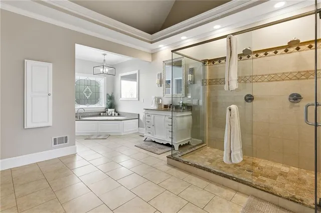 a bedroom with a bed and dresser