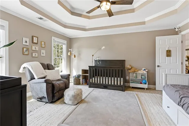 a bedroom with a bed and furniture