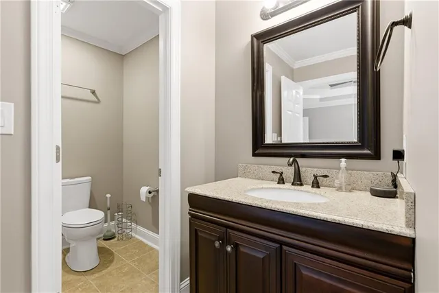 a bedroom with two beds and a large window