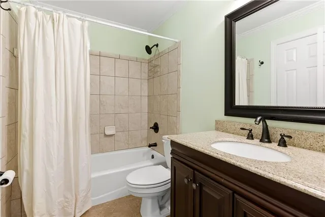 a view of a patio with couches and a fire pit