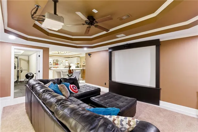an aerial view of a house with swimming pool patio and outdoor seating