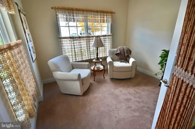 a kitchen with stainless steel appliances granite countertop a refrigerator and a stove