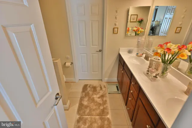 a bedroom with furniture and a chandelier