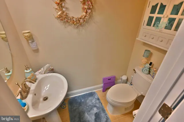 a bedroom with two beds and a window