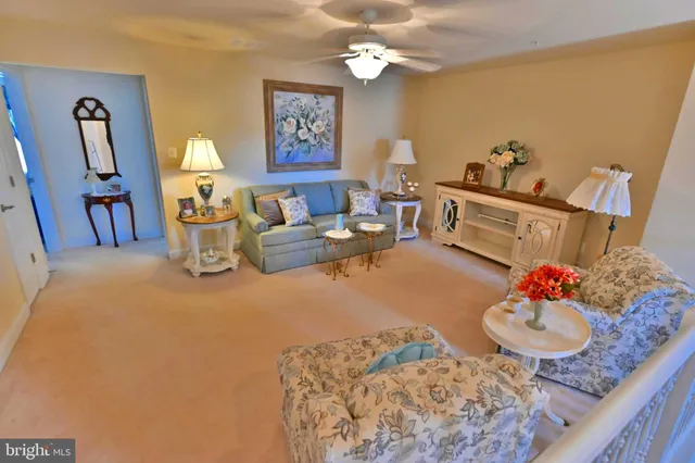 a bedroom with furniture and a dresser