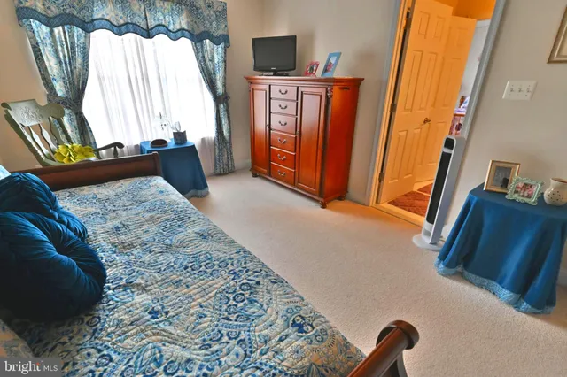 a view of a house with backyard sitting area