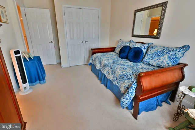 an aerial view of a house with a lake view