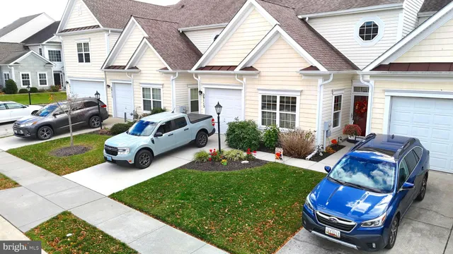 a view of a livingroom with furniture and a table