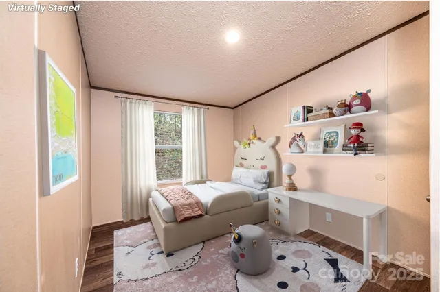 a bedroom with furniture and a window