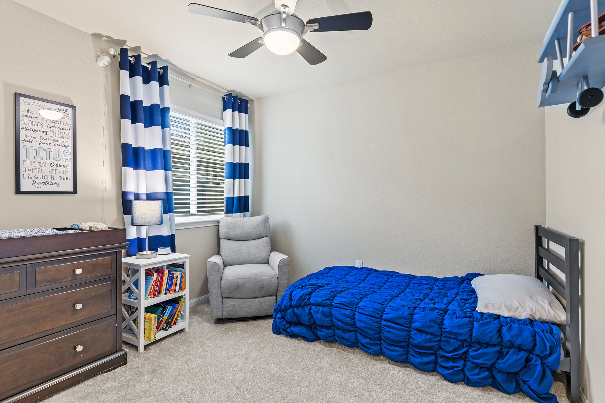 404 Cassandra Drive Hutto, TX 78634 - Photo 20 of 40 Carpeted bedroom with a ceiling fan and baseboards