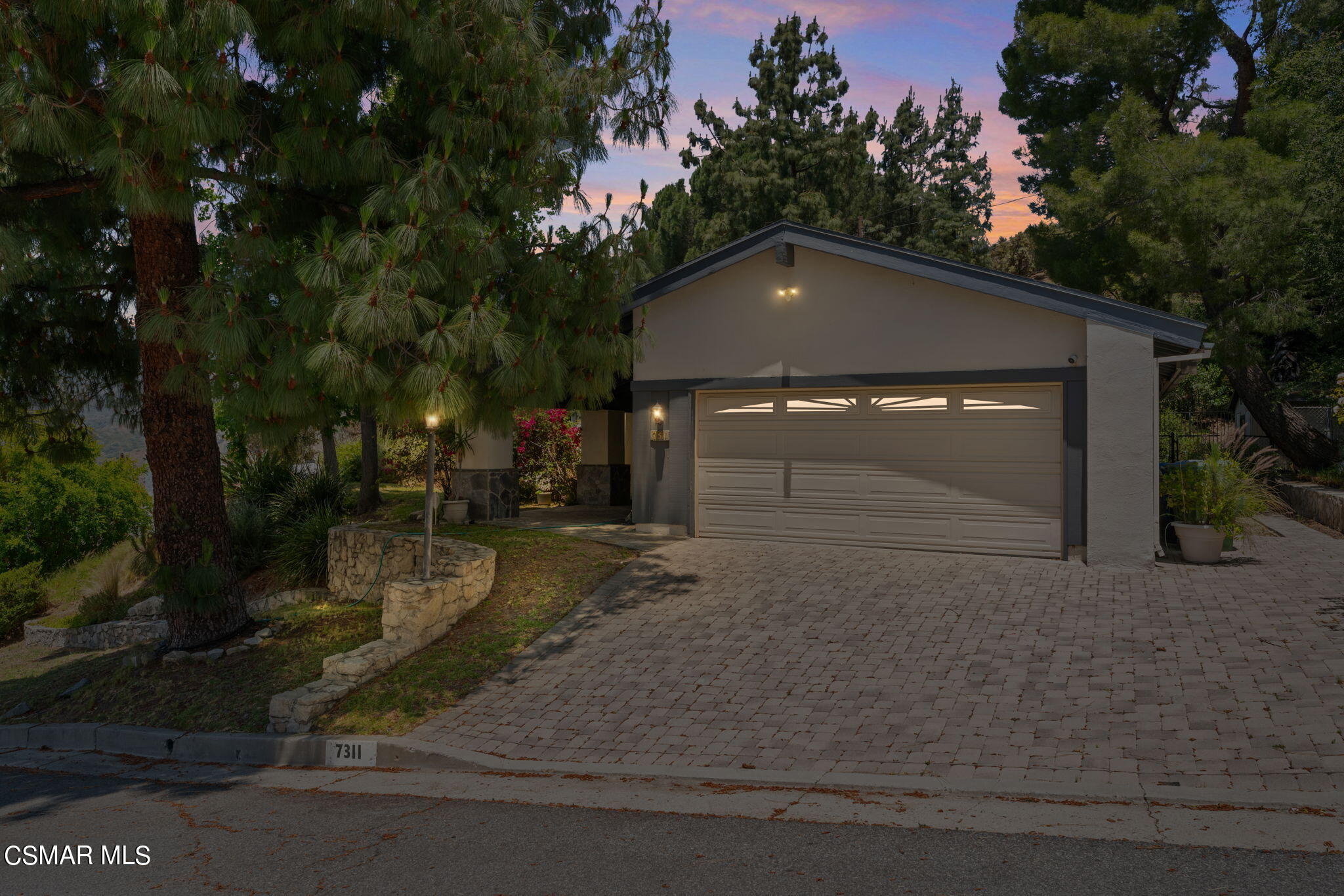 7311 Alpine Way Tujunga, CA 91042 - Photo 6 of 6 a backyard of a house with lots of green space
