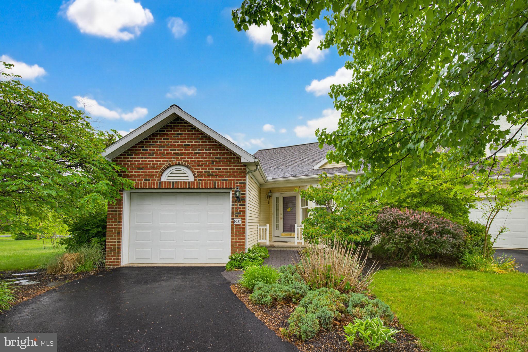 1037 Kent Garden Lititz, PA 17543 - Photo 1 of 31 a view of a house with a small yard plants and large tree