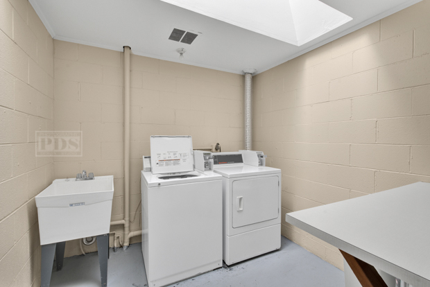 1114 Springinsguth Road, Unit 2A Schaumburg, IL 60193 - Photo 17 of 19 a utility room with dryer and washer