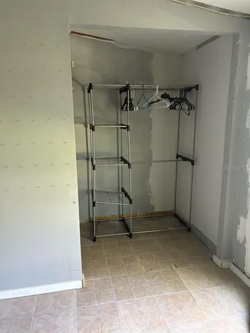 a view of a room with an empty space