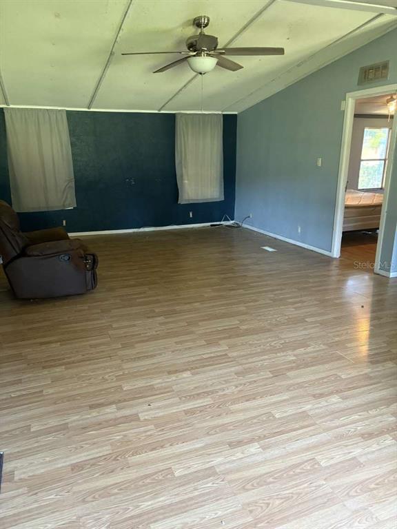 7098 North Golden Point Hernando, FL 34442 - Photo 9 of 11 a view of a room with wooden floor