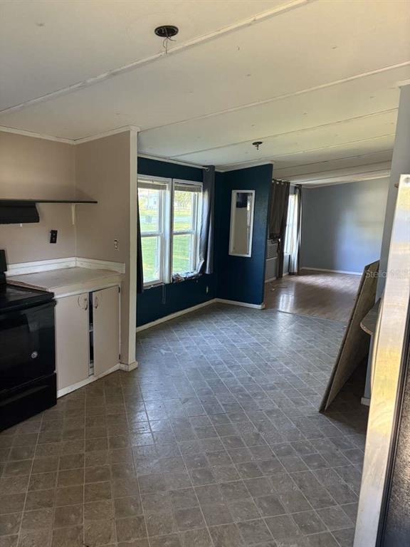 7098 North Golden Point Hernando, FL 34442 - Photo 10 of 11 a view of a kitchen with a sink cabinets and a window