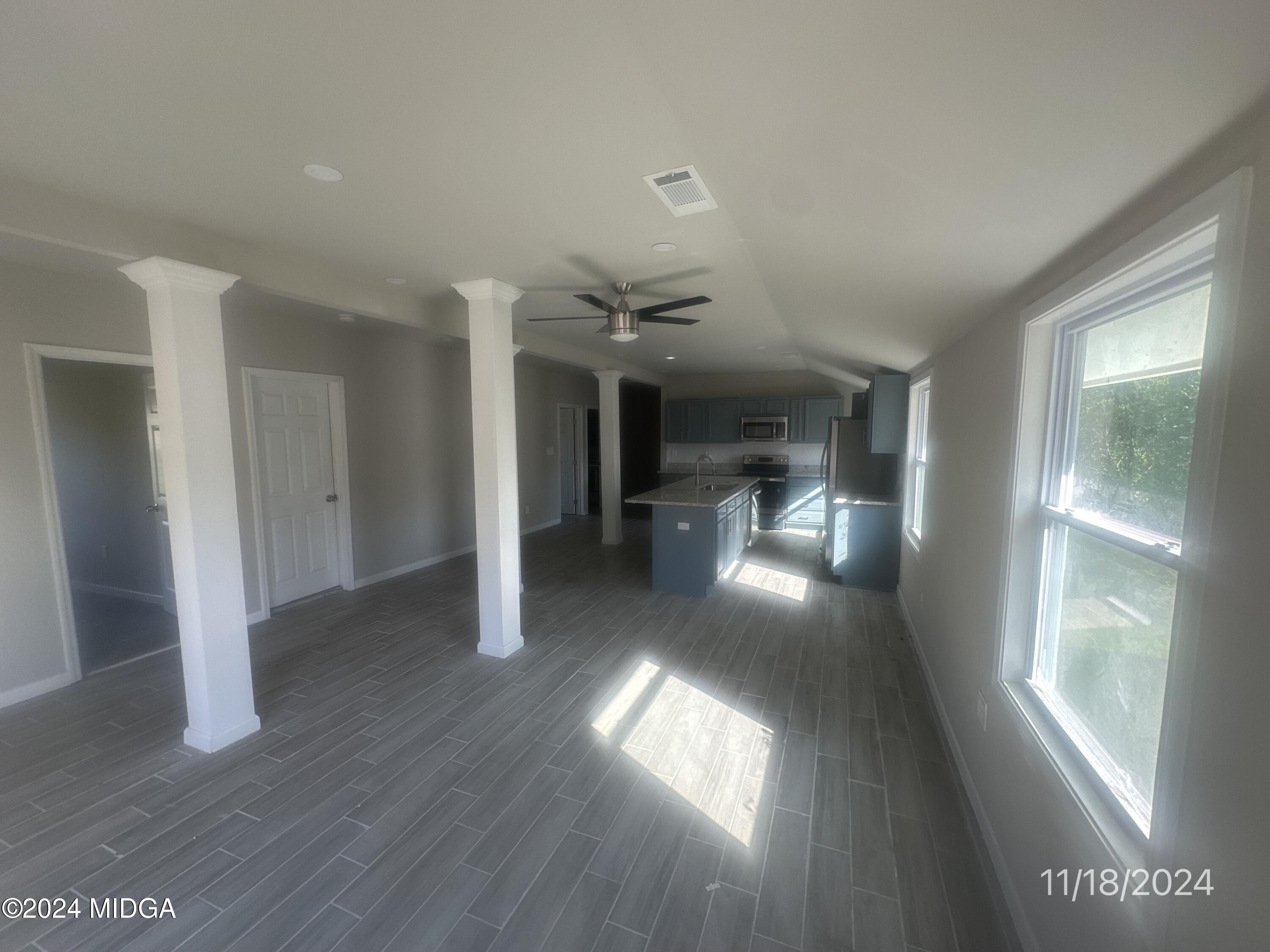 735 Maynard Street Macon, GA 31217 - Photo 4 of 9 a view of gallery with wooden floor