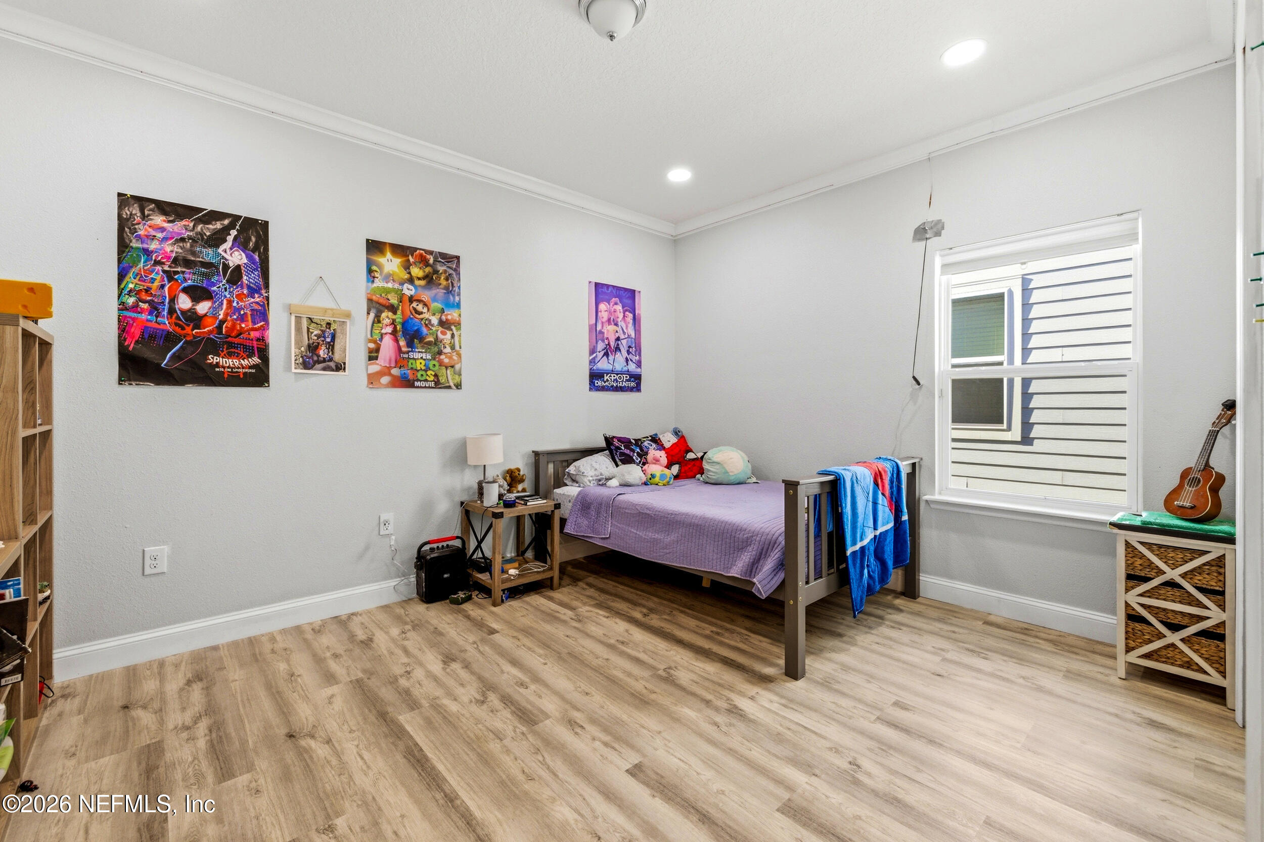 113 Howell Court St. Augustine, FL 32092 - Photo 44 of 63 a bedroom with furniture and a bed